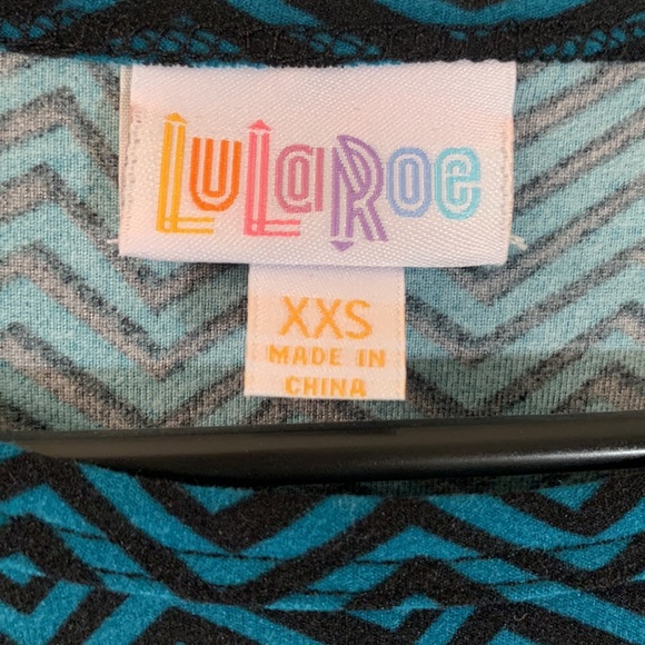 LULAROE Irma Turquoise Wicked Design Top NWT - Picture 10 of 11